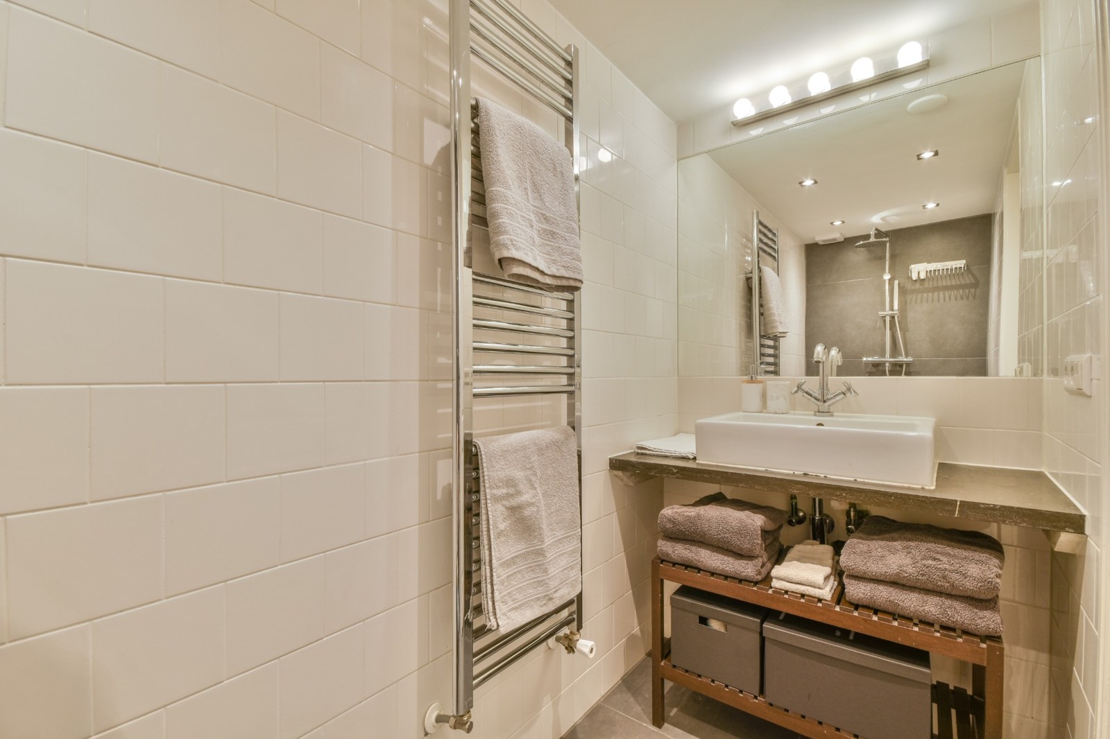 Bathroom with a tall towel rail